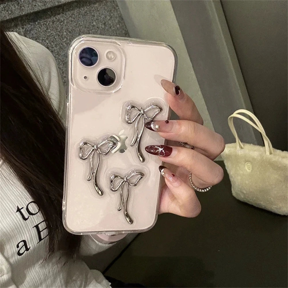 Coque de téléphone élégante en métal 3D avec nœud papillon pour iPhone 16 15 14 13 12 11 Pro Max Mini XR 7 8 Plus SE Coque transparente en époxy