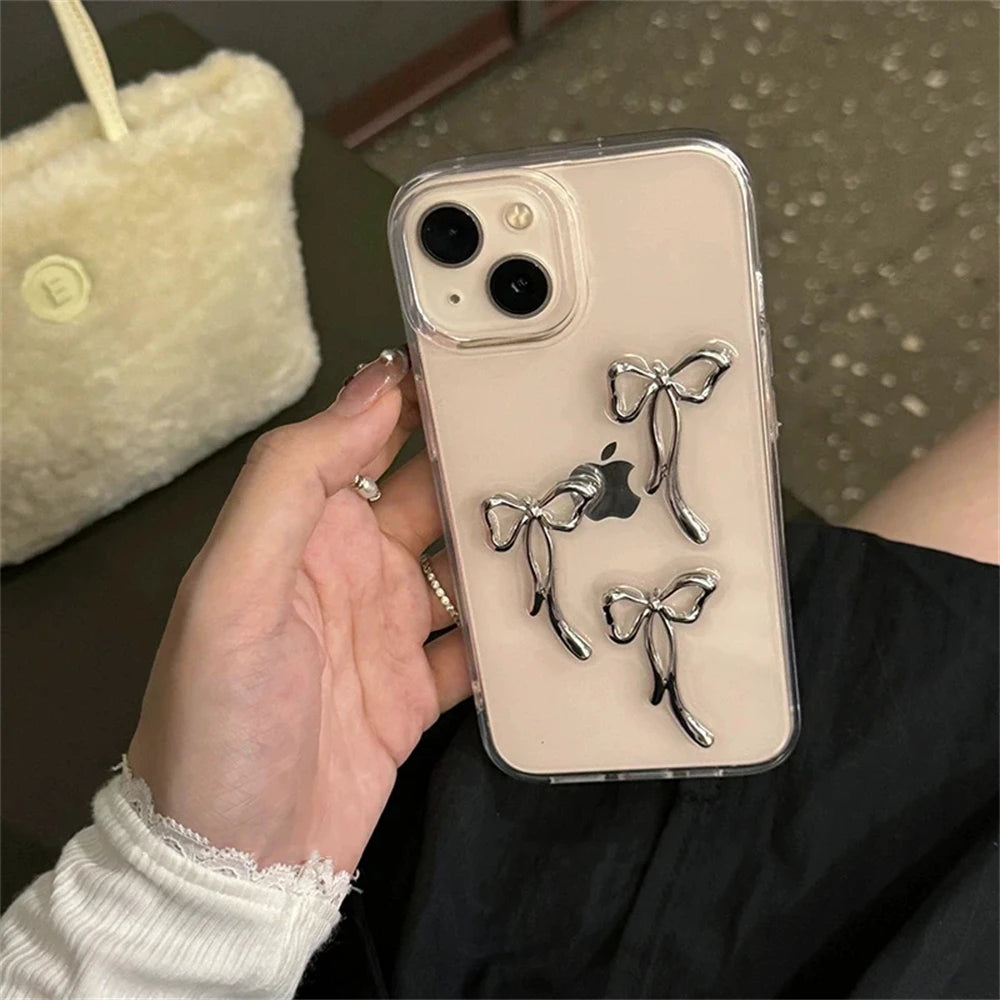 Coque de téléphone élégante en métal 3D avec nœud papillon pour iPhone 16 15 14 13 12 11 Pro Max Mini XR 7 8 Plus SE Coque transparente en époxy
