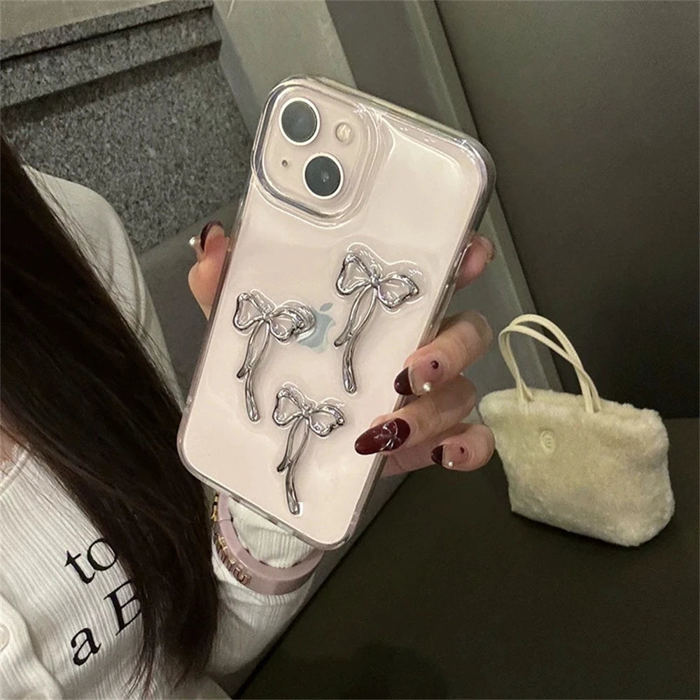 Coque de téléphone élégante en métal 3D avec nœud papillon pour iPhone 16 15 14 13 12 11 Pro Max Mini XR 7 8 Plus SE Coque transparente en époxy