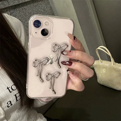 Funda de teléfono con lazo de metal 3D elegante y estética para iPhone 16, 15, 14, 13, 12, 11 Pro Max, Mini XR, 7, 8 Plus, SE, carcasa de epoxi transparente